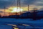 Train passing by at the sunset